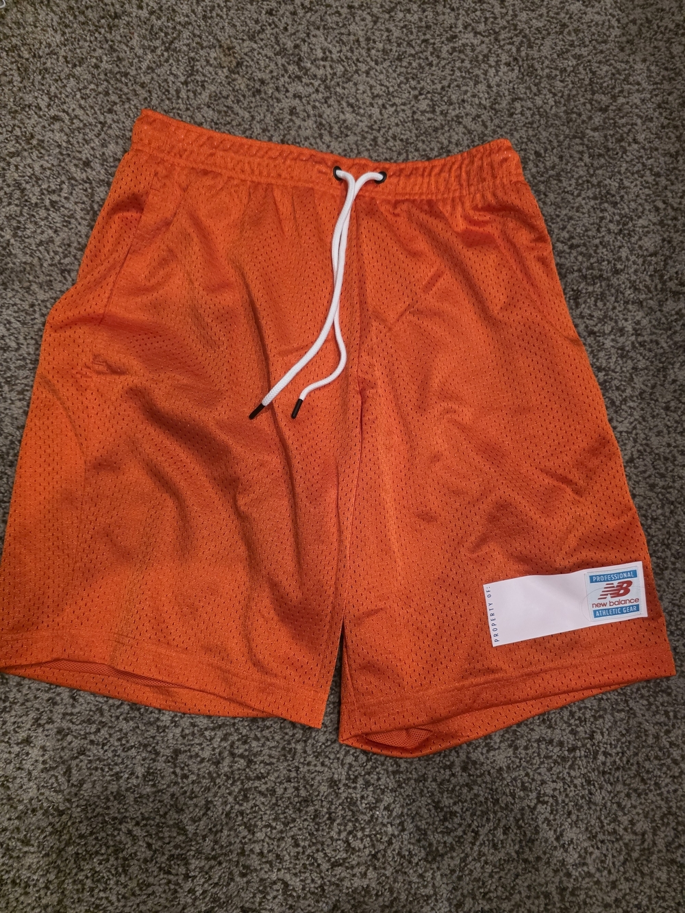 New Balance Men’s Bright Orange Mesh Athletic Shorts with White Drawcord